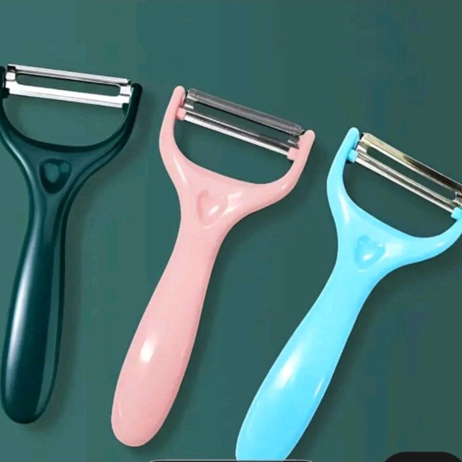 Black, pink and blue swivel peelers